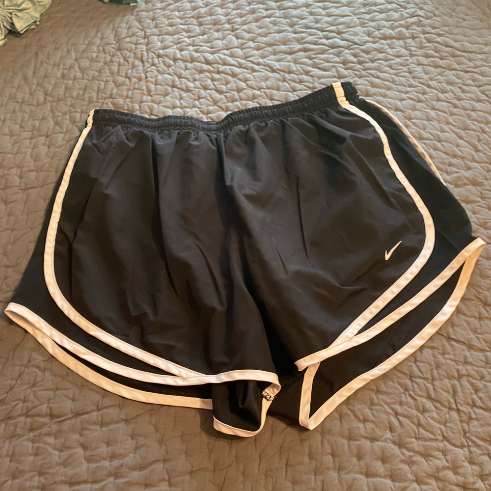 Women’s black Nike dry-fit shorts, Size L.